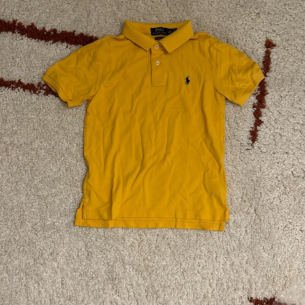 Boy’s yellow polo